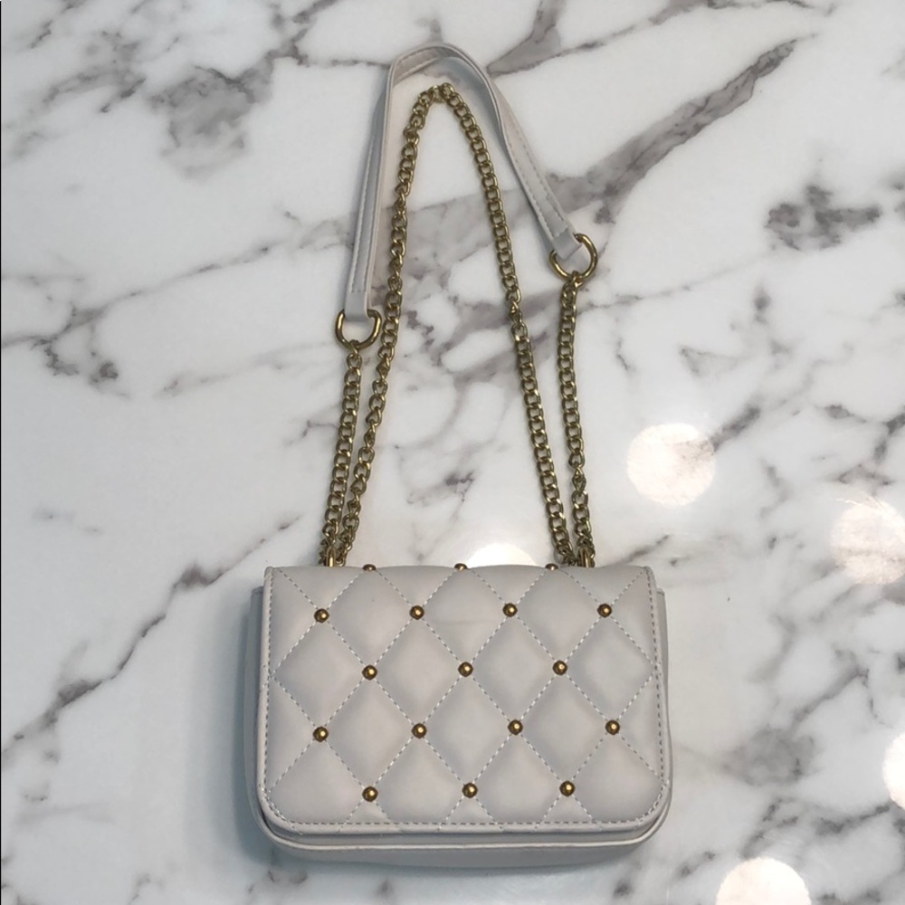 White purse with crossbody chain